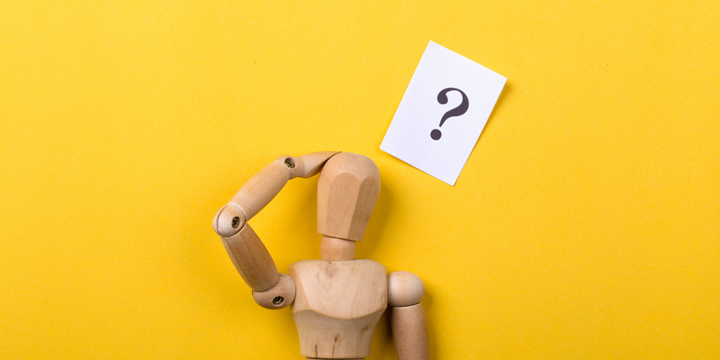 Wooden person with question mark