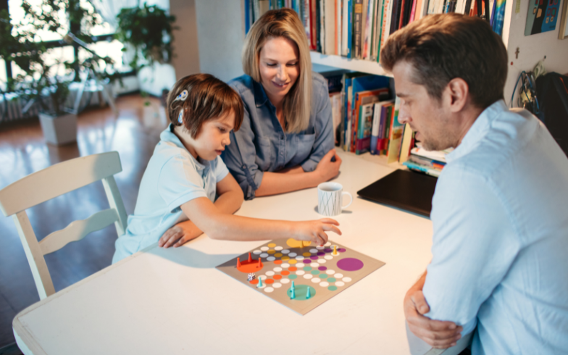 Family playing board game