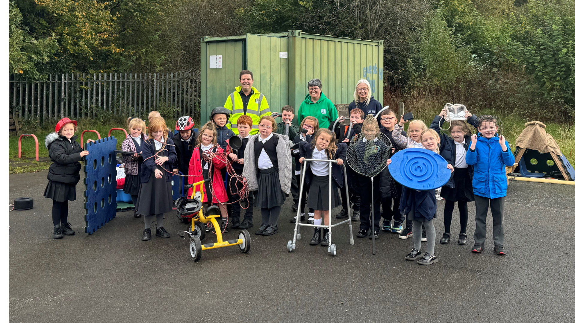 Plan B Management Solutions Representative Huw Davies with council staff Angela Tozer, Kelly Wake and Year Two pupils at Garth Primary School.