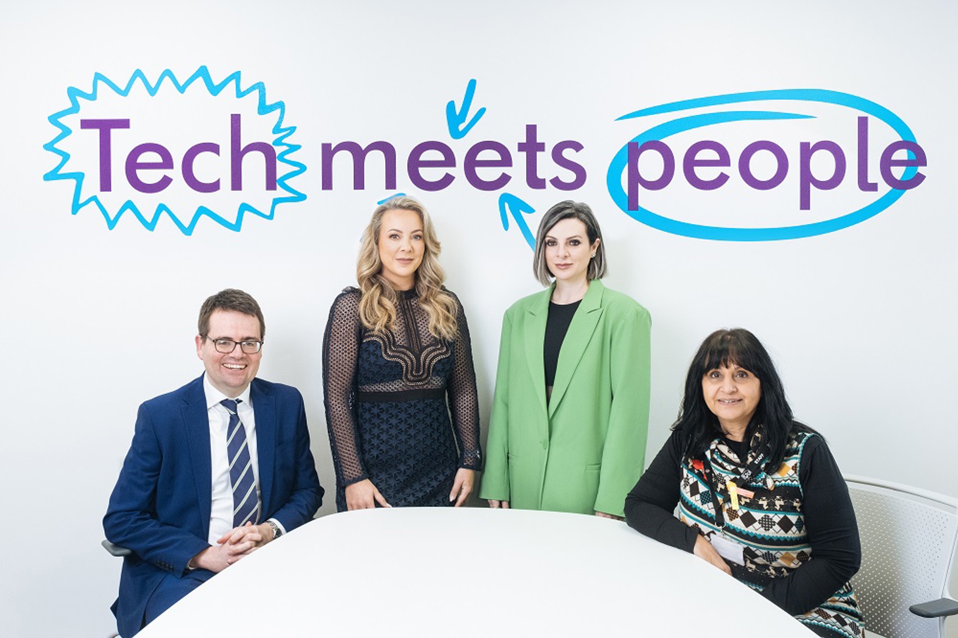 Council Leader, Cllr Huw David with Sophie Hughes & Lucy Cohen, Mazuma and Cllr Neelo Farr, Cabinet Member for Community Safety and Wellbeing.