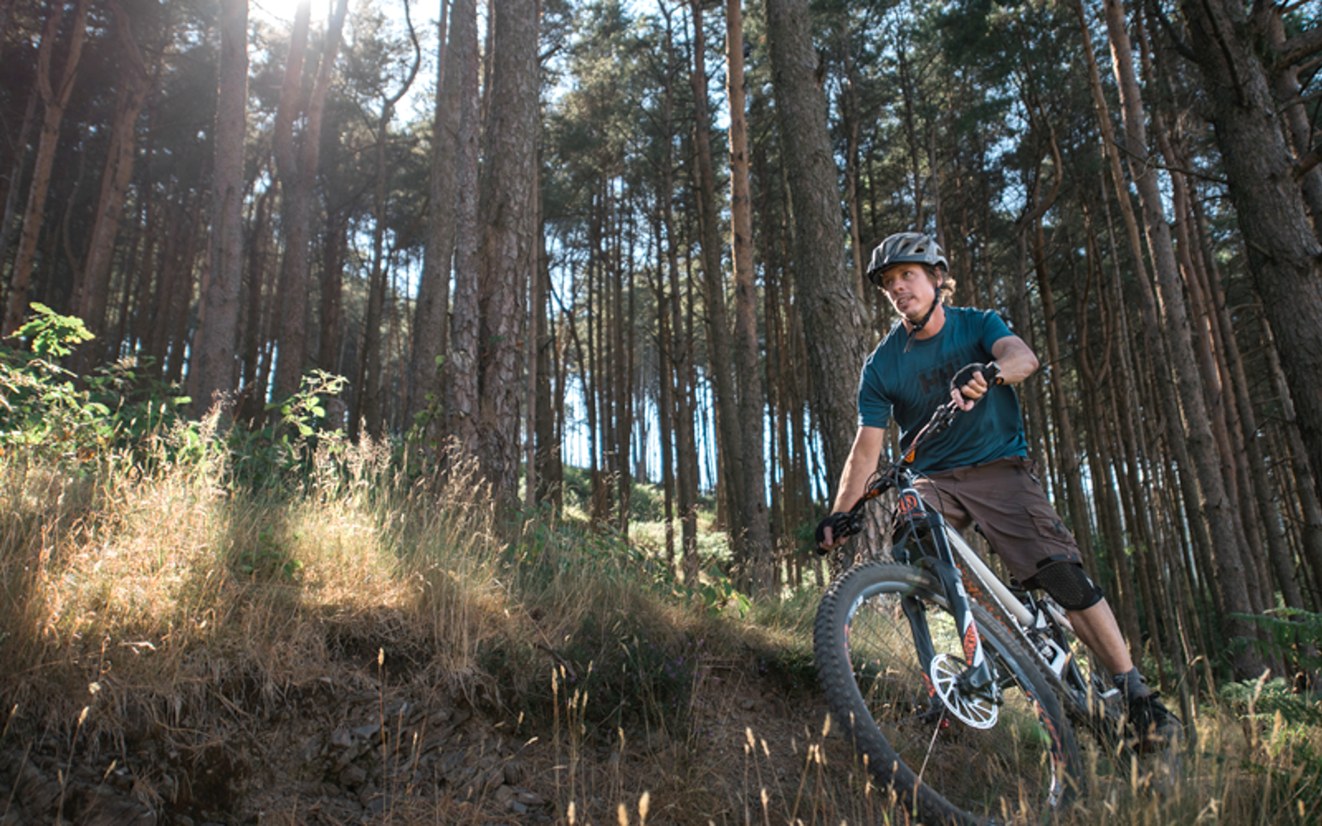 Cyclist on mountain bike trail